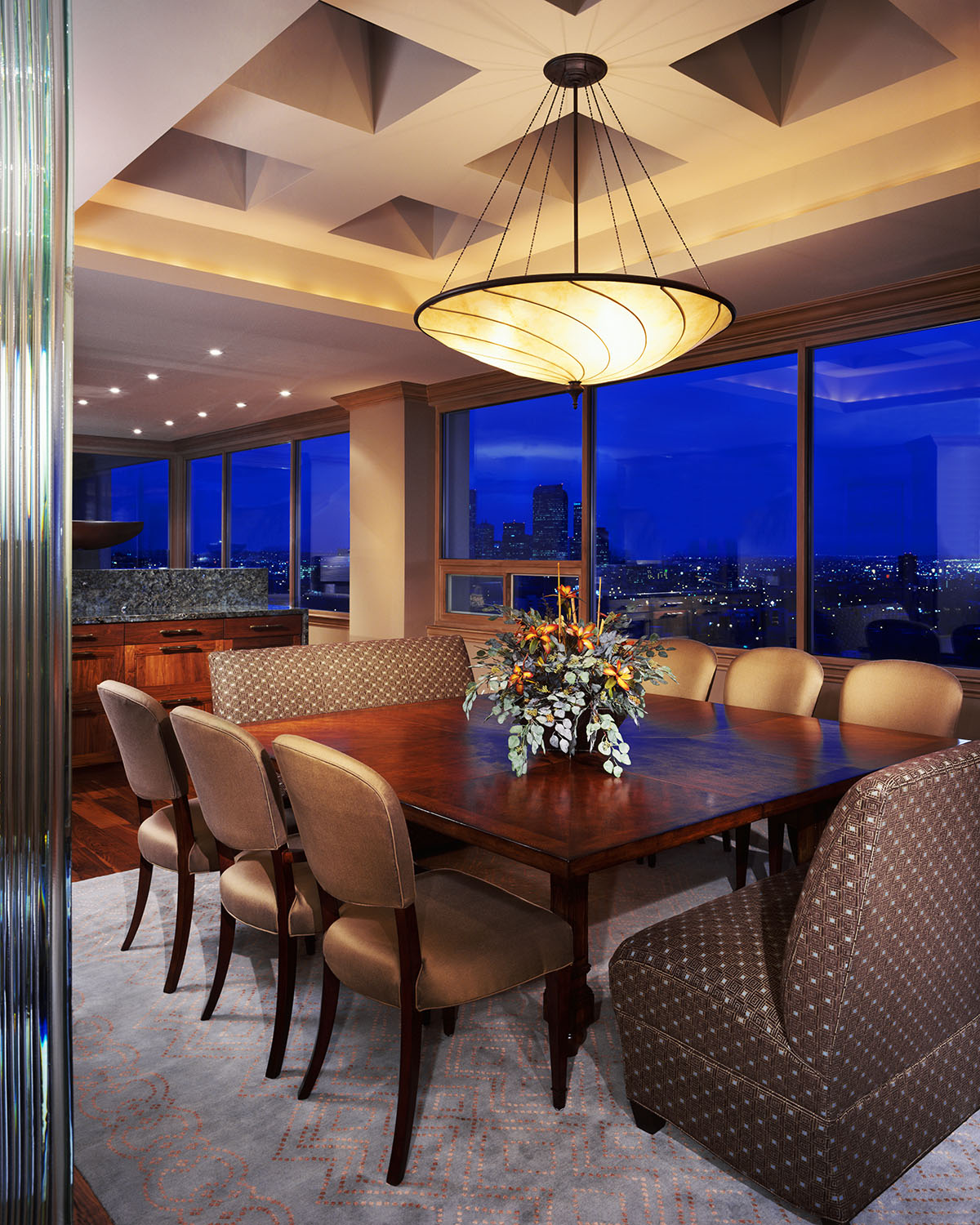 Penthouse dining room view of downtown denver