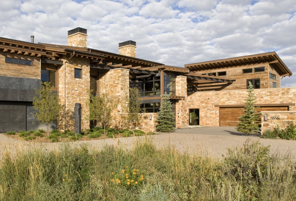 Timbers, Zinc and Stone Rustic home.